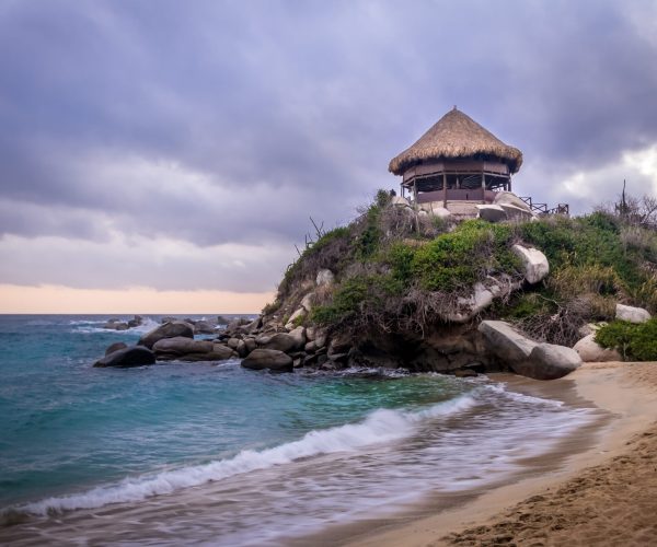 sunset-and-beach-hut-at-cabo-san-juan-tayrona-na-2023-11-27-05-24-45-utc-min